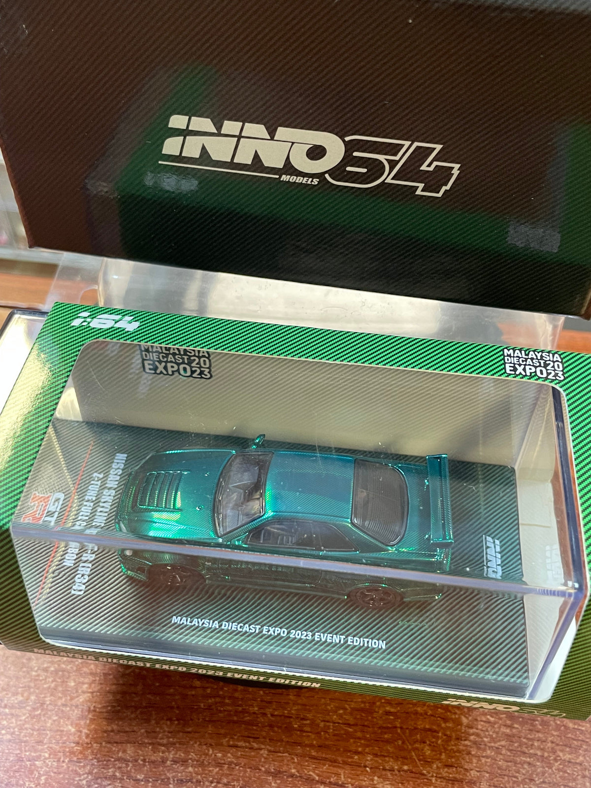 Nissan Skyline GT-R R34 Full Carbon Green (Inno64, Diecast ) **EXCLUSIVE** product image 2, provided for visual reference