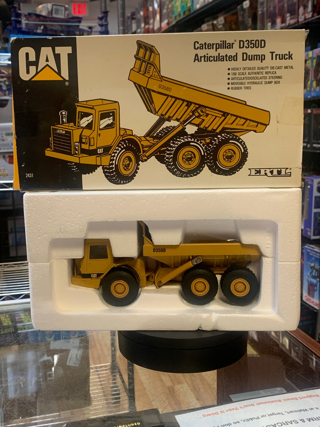 Caterpillar D350D Articulated Dump Truck 1/50 Scale ( Vintage ERTL, CAT) product image 1, provided for visual reference and