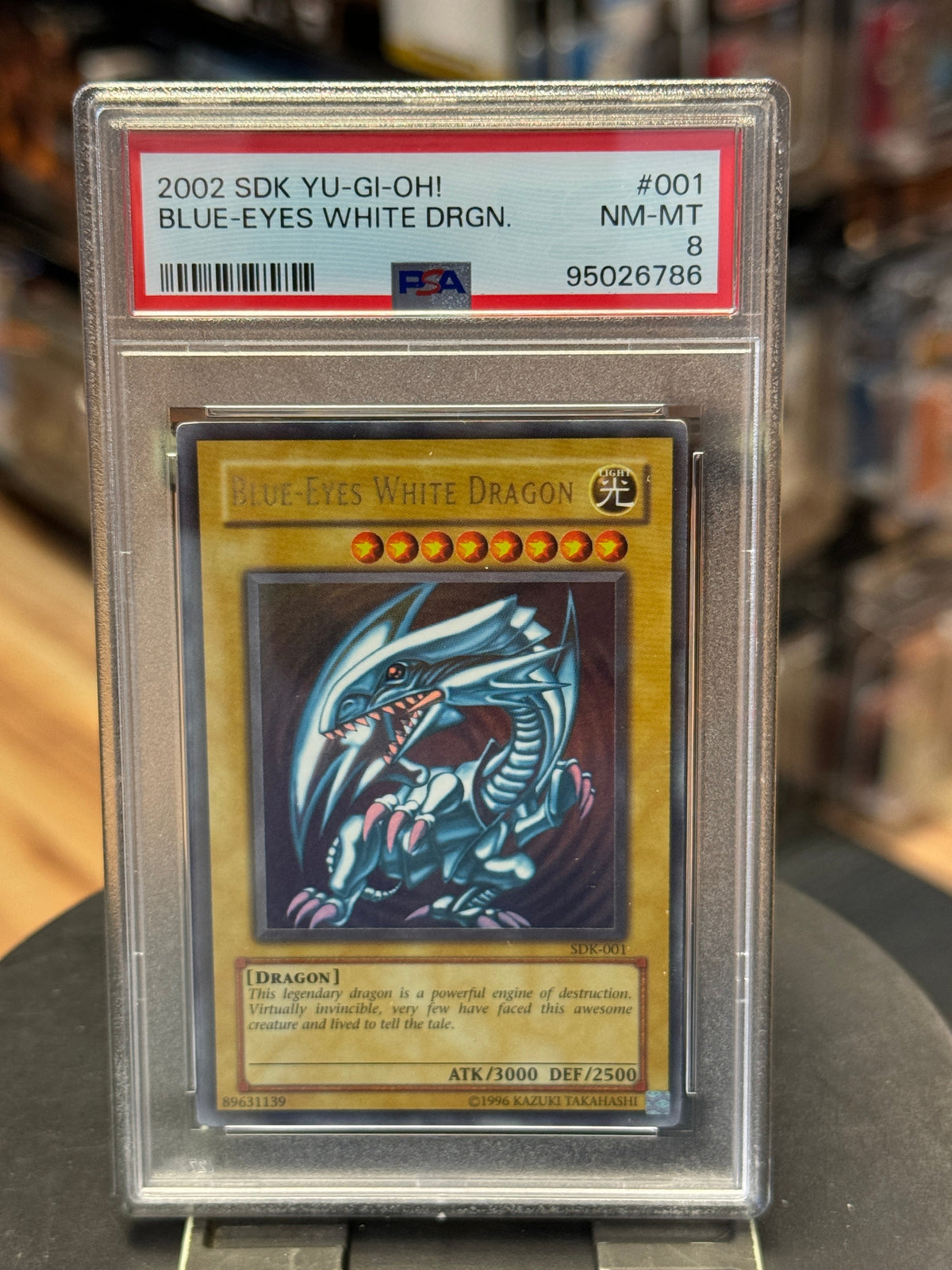 SDK-001 Blue Eyes White Dragon 2002 (Kazuki, Yu Gi Oh) ** PSA Graded 8 ** product image 1, provided for visual reference and